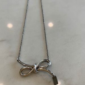 Coach sterling silver bow necklace